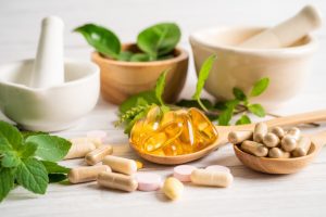 Alternative medicine herbal organic capsule drug with herbs leaf natural supplements