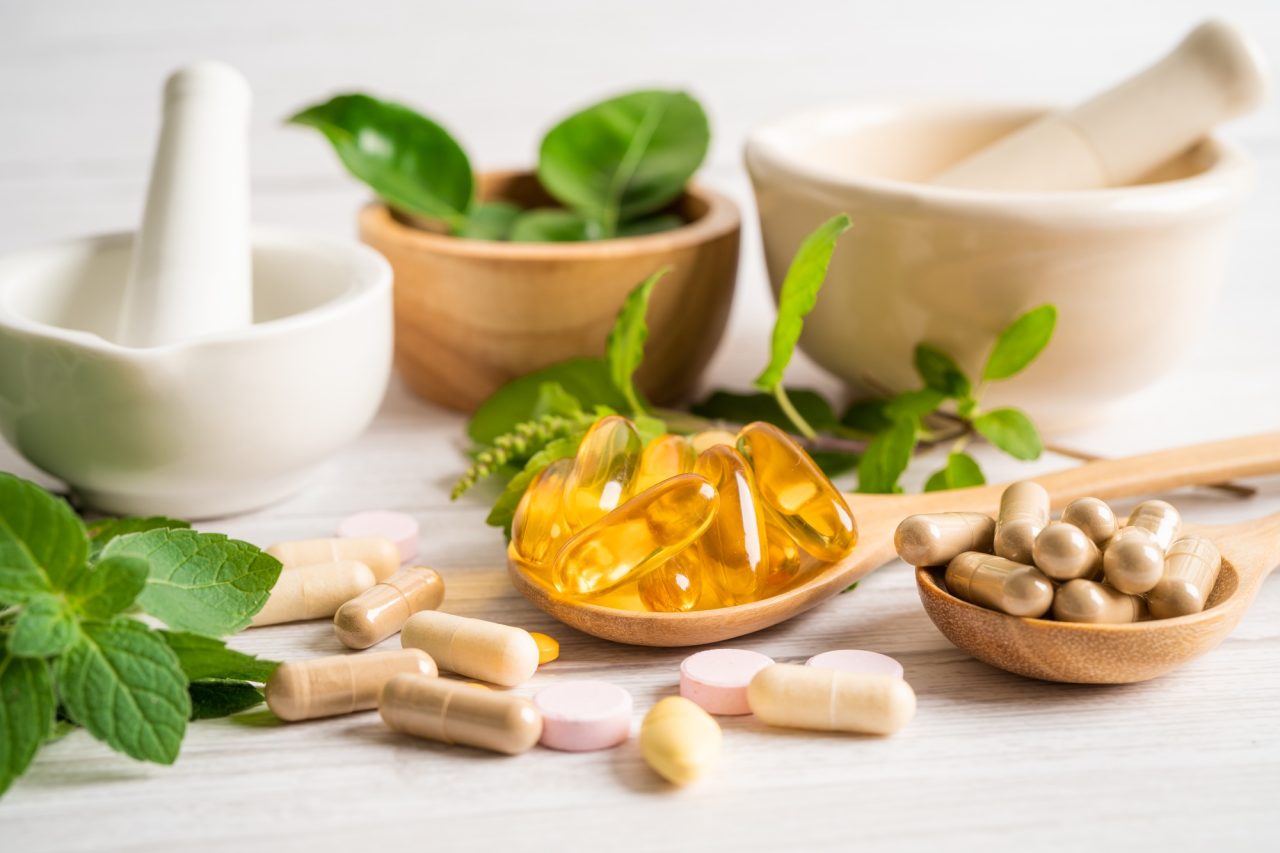 Alternative medicine herbal organic capsule drug with herbs leaf natural supplements